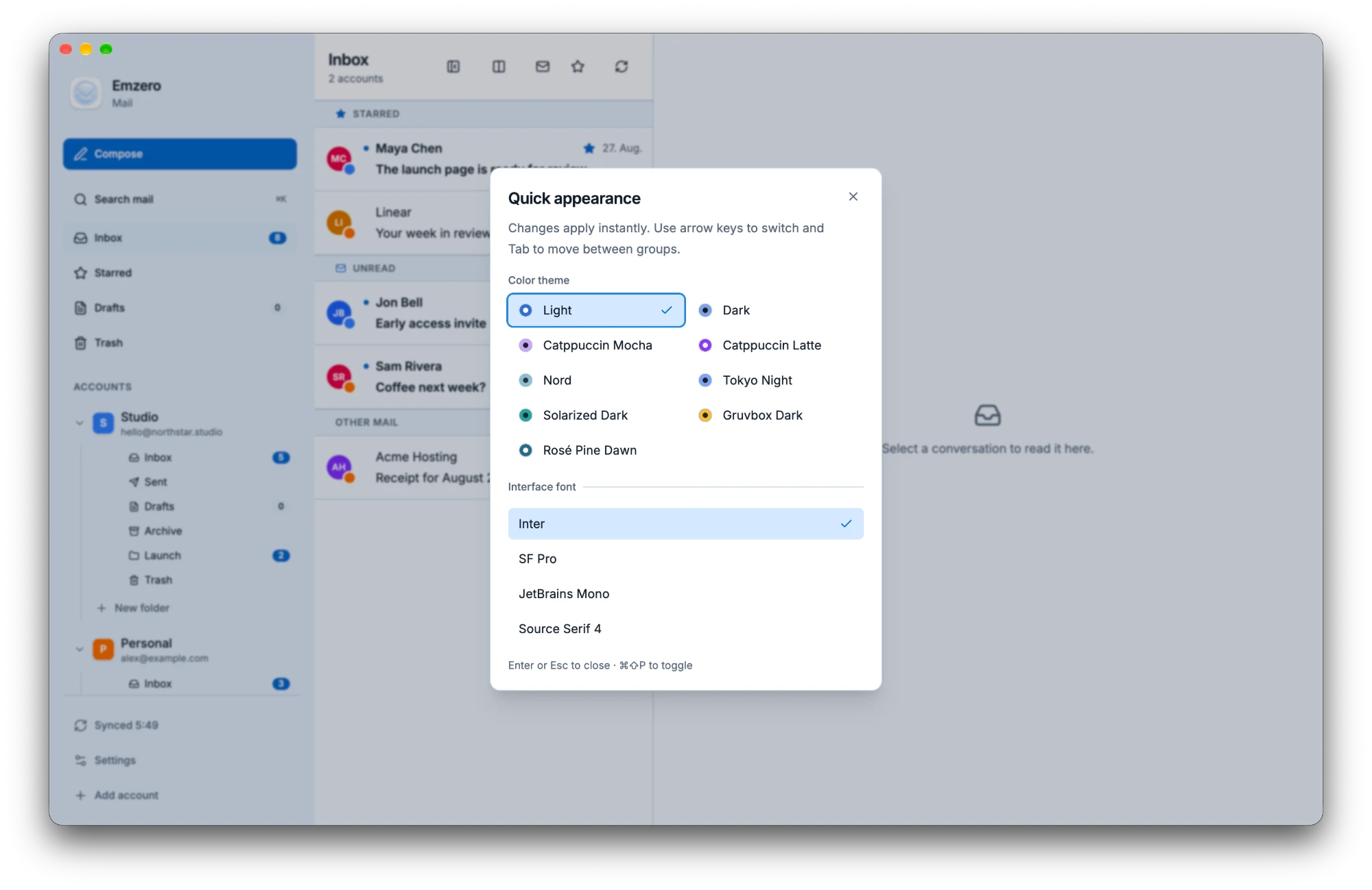 Emzero appearance picker with theme and font choices.